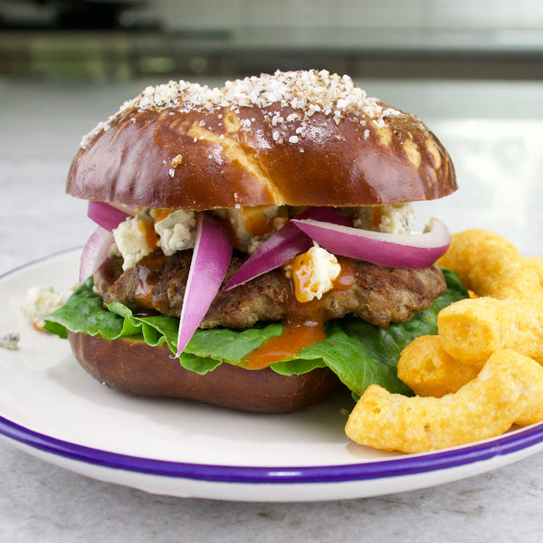 Spicy Truffle Burger On A Pretzel Bun 